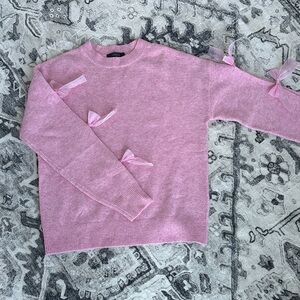 Elegant Pink Sweater with Bow Details